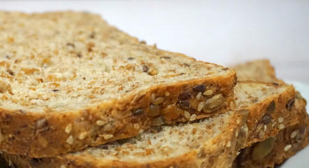 Sprouted Whole Grains Sliced Bread close up. Healthy eating concept.