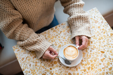 Woman with latte