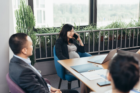 Asian people working in office