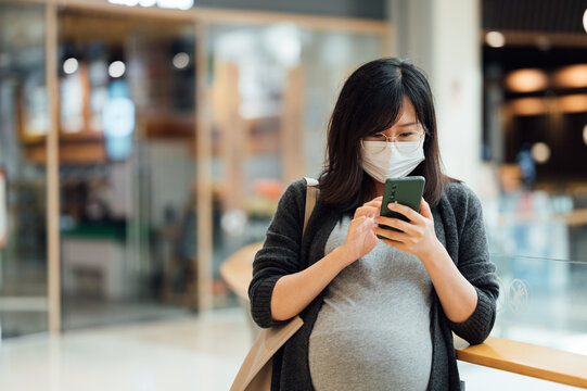 Pregnant woman in the mall