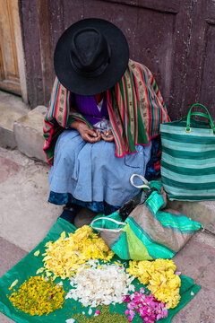 Bolivian woman selling flowers on the street