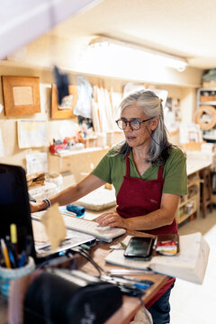 Woman Working in Pottery Workshop