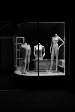 Naked mannequins in an empty shop