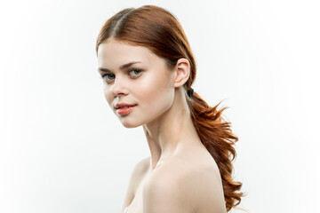 Fototapeta premium pretty woman makeup on face naked shoulders gathered hair attractive look