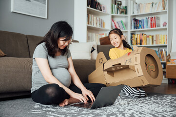 Pregnant woman working from home