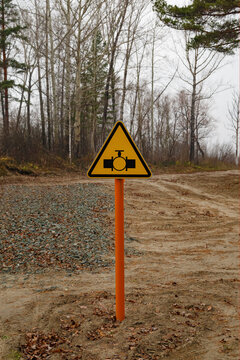 Gas pipeline warning sign in countryside