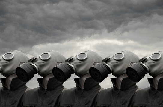 A group of soldiers in gas masks