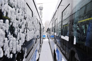 Naklejka na ściany i meble Almaty, Kazakhstan - 01.28.2014 : The passage between the lined-up buses in the car park
