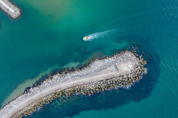 motor boat enters the harbour
