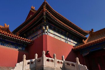 Young woman posing in Beijing's Forbidden City