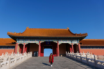 Young woman posing in Beijing's Forbidden City