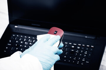 Disinfecting wipes to wipe surface of desk , keyboard, mouse at office. Stop the spread of...