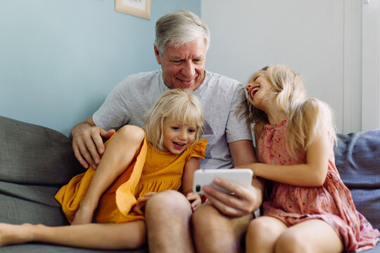 Grandfather with girls
