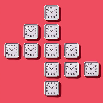 some white clocks on a red background