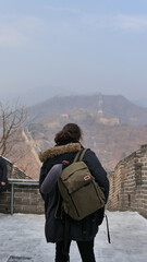 Young man on the Chinese wall