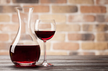 Wine decanter and glass of red wine
