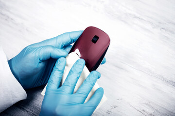 Disinfecting wipes to wipe surface of desk , keyboard, mouse at office. Stop the spread of...