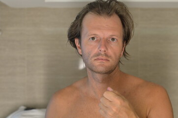 Obraz premium Beauty men. Hair loss men. man in bathroom. 