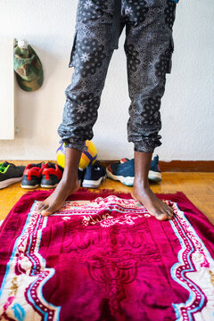 Black Muslim Praying At Home.