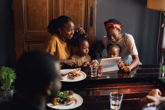 An African American Family in a Restaurant