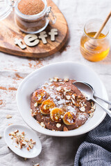 Teff grain porridge with banana topping for breakfast