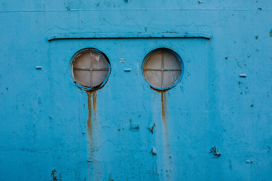 Porthole of a blue ship