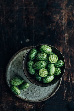 Tiny cucamelons in bowls