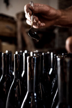 Wine producer who applies beeswax to the stoppers of organic win