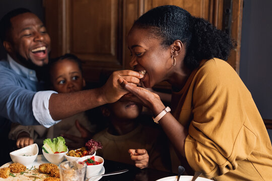 Family Time Is the Best Time - A Man Feeding His Wife