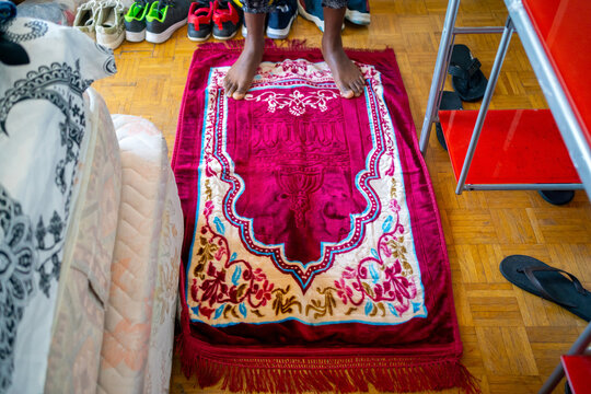 Black Muslim Praying At Home.