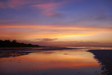 Fototapeta premium Peaceful and colorful sunset on Walakiri beach near Waingapu, Sumba island, East Nusa Tenggara, Indonesia