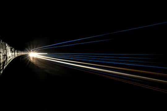 Car and truck light trails. Long exposure photo taken in a tunnel below Veliko Tarnovo