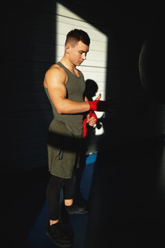Boy with muscles admiring martial arts