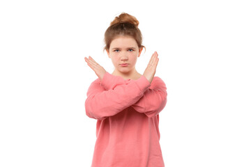 Serious-looking determined teen girl making stop sign with crossed hands, saying stop