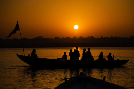 Varanasi Sunrise View With Boats Floating Over Ganges river