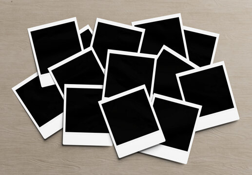 Stack of instant photos Mockup. Pile of retro photographs on wooden 3D rendering