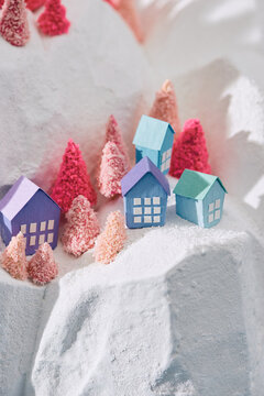 depicting a miniature snowy village, ideal for Christmas, New Year and Epiphany cards