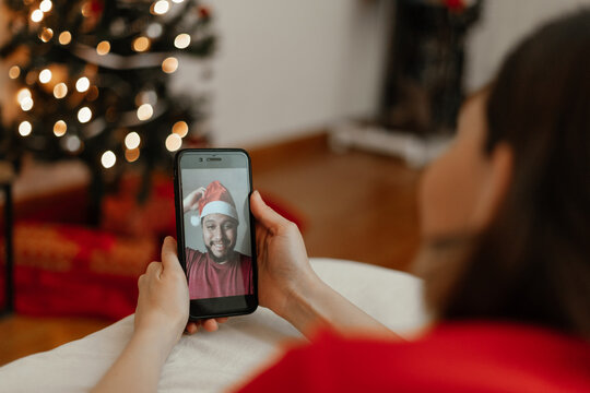Young couple in a facetime videocall at christmas