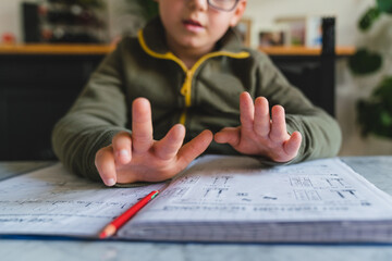 Kid Calculating during Homework