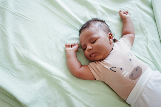 A newborn child.