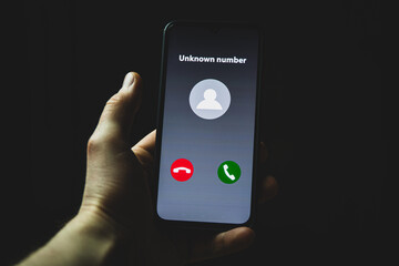 Incoming call from unknown number. Scam online on phone