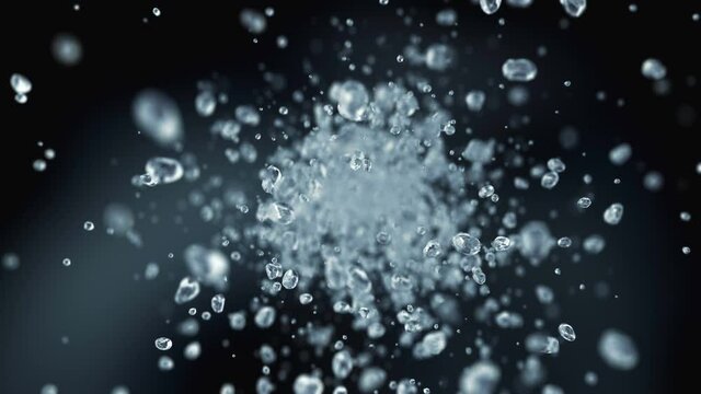 Water drops flying in super slow motion 4K