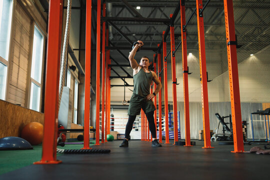 Sportsman developing definition of muscles