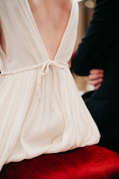 close up of classic and simple dress with bow on the back