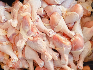 Pile of chicken raw legs