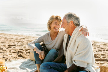 Mature married couple hugging each other