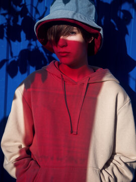 Portrait of a young beautiful girl through a red filter