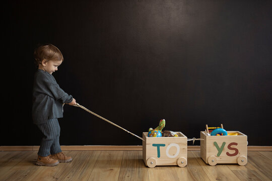 Little Boy Playing With Toys