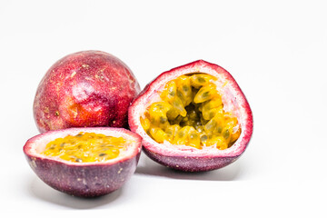Slices ripe passion fruit isolated in white
