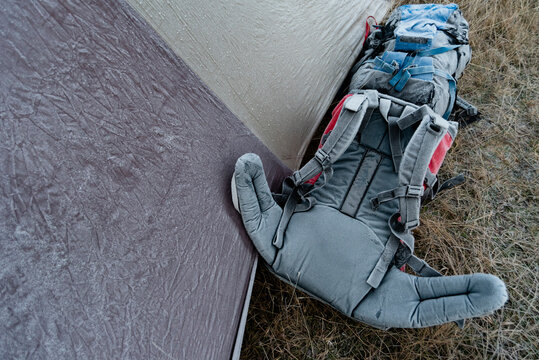 Backpacks covered in frost, New Zealand.
